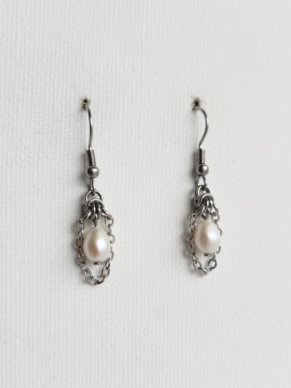 Long silver and pearl earrings